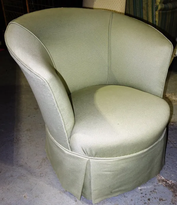 An early 20th century small tub back armchair on splayed supports.  I3