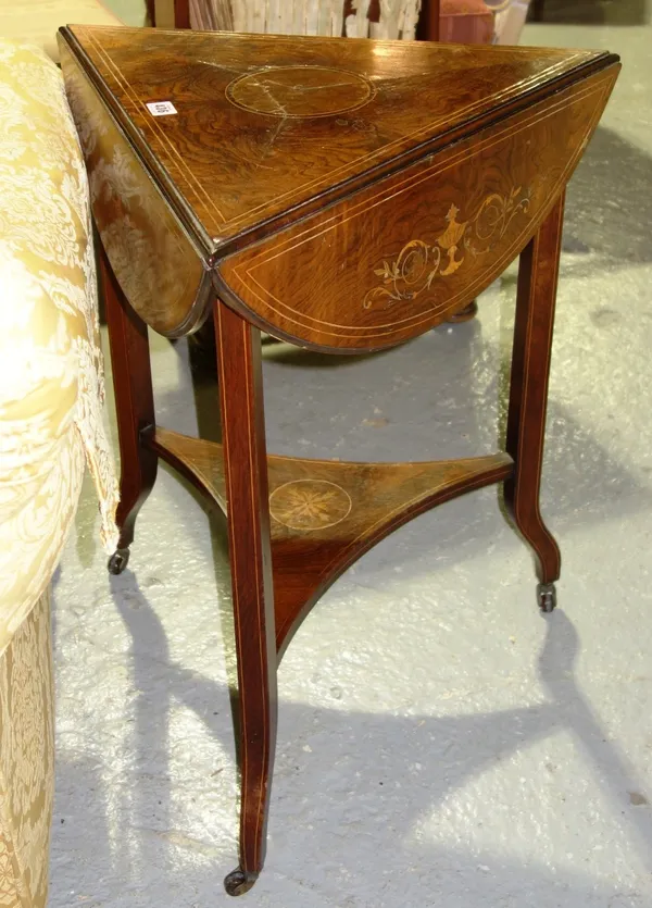 An Edwardian inlaid rosewood triangular drop flap table, 59cm wide, together with a Victorian walnut games table on open reeded baluster supports, 61c