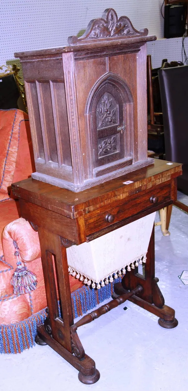 A 19th century rosewood work table, and a small oak cupboard with carved door (2).  C3