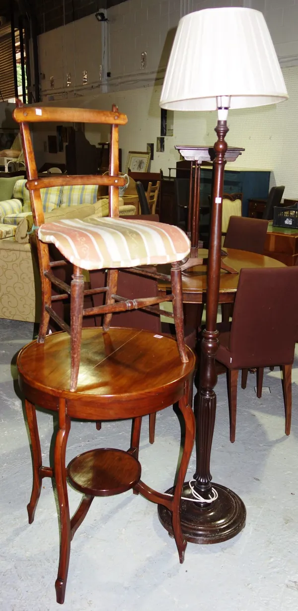 A walnut circular two tier table, a standard lamp and a side chair (3).  F2