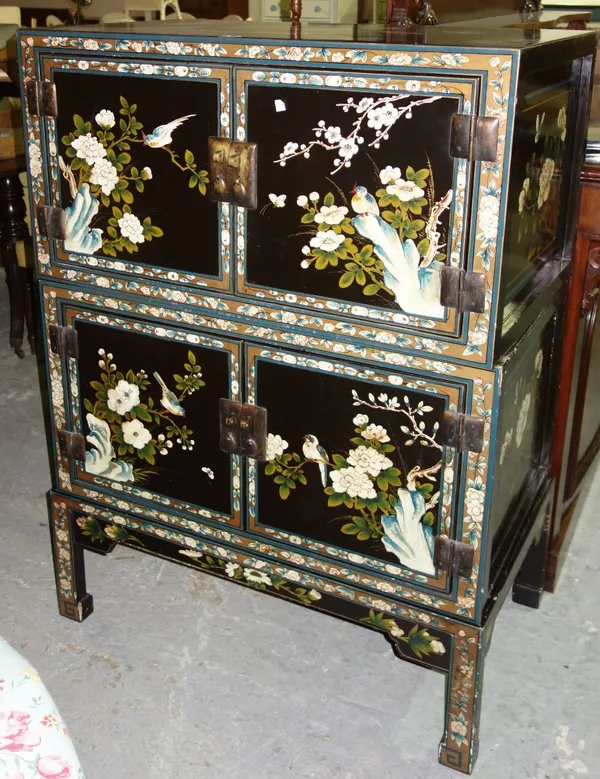 A Chinese lacquered cabinet with pair of cupboards over a pair of cupboards,  62cm wide.  F5