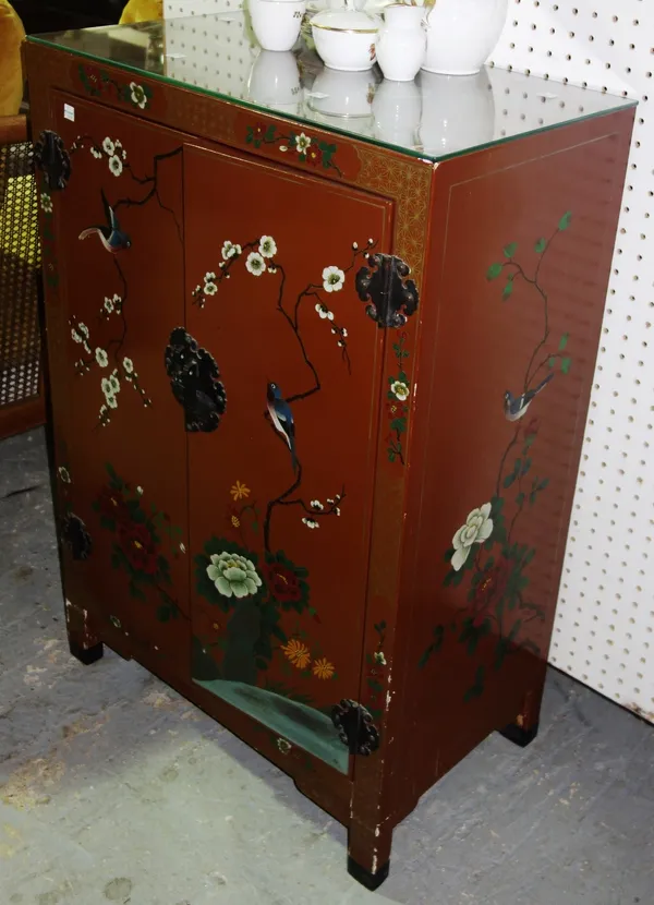 A small Chinese hardwood cabinet fitted with a plated canteen of cutlery,  73cm wide  F8