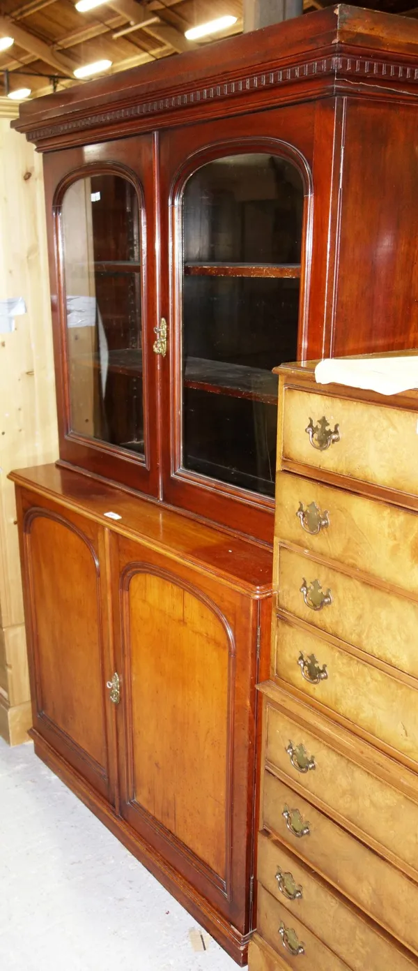 A Victorian mahogany display cabinet/cupboard, with pair of glazed doors over a further pair of panelled doors, on plinth base, 117cm wide.  L8