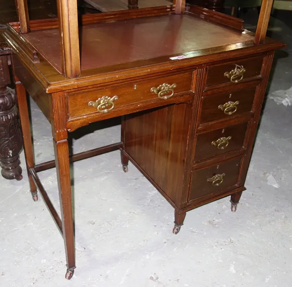 J.A.S. Shoolbred & Co; a late 19th century walnut writing desk, with five various drawers, 84cm wide.  E7