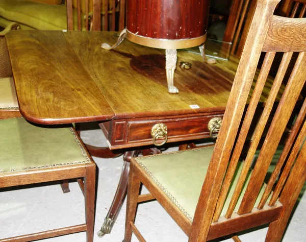 An early 20th century mahogany drop flap centre table on turned column and four down swept supports, 95cm wide.   D7