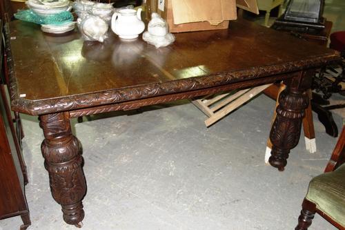 A Victorian oak extending dining table two extra leaves, 120cm x 142cm x 220cm. E7