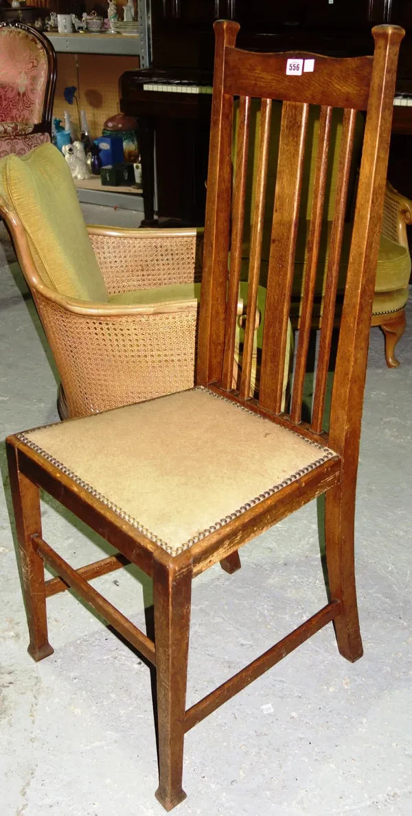 A set of six Arts and Crafts oak framed dining chairs. (6)  D7