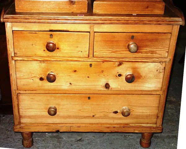 A pine chest of two short and two long drawers with three-quarter galleried back.  H5