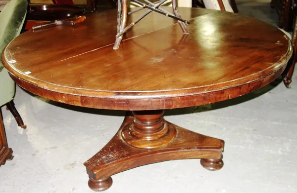 A William IV mahogany circular snap top breakfast table on triform base, 130cm wide. G7