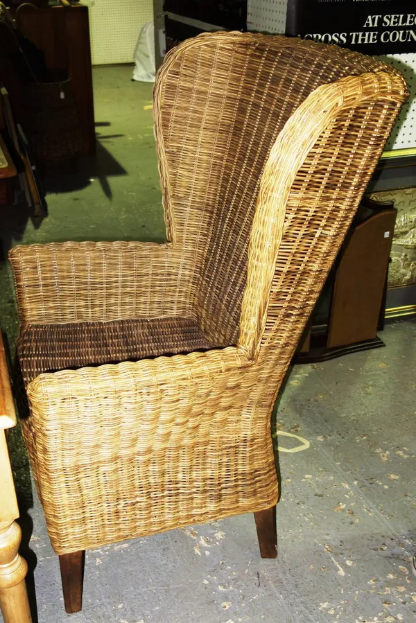 A 20th century Orkney style cane armchair.   H8