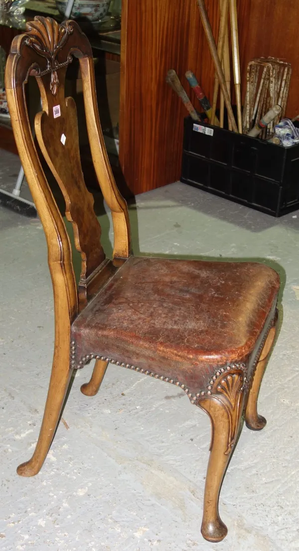 A set of six 20th century Queen Anne style walnut vase back dining chairs. (6)  GAL