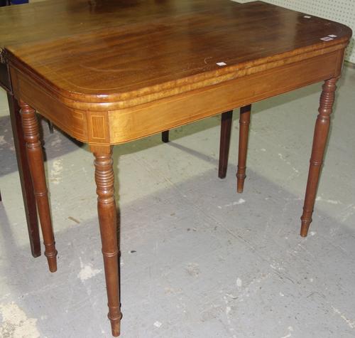 An early 20th century mahogany folding card table.   GAL