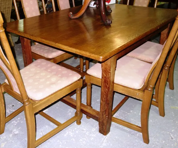 A 20th century oak rectangular dining table, 145cm wide.    J8