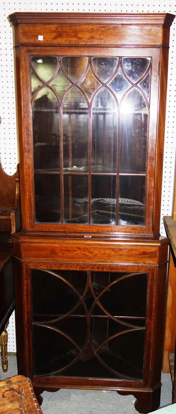 A 19th century mahogany satinwood banded floor standing corner cupboard, 73cm wide.   M3