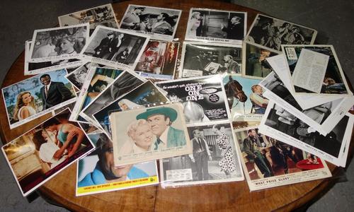 A large quantity of assorted lobby cards, including 'Love Me Or Leave Me', 'Sahara', 'Fast Forward', and 'Swing Shift'.  CAB