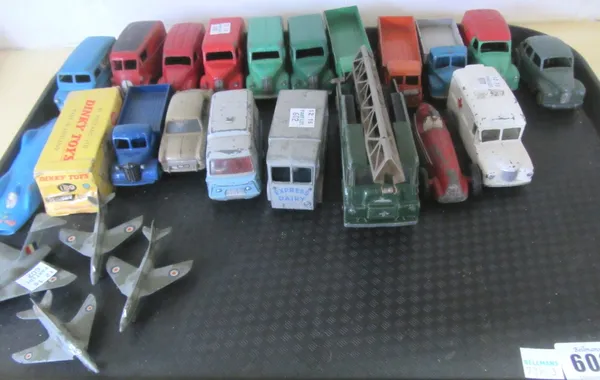 A quantity of Dinky die-cast vehicles, pre and post war, including; 260 Royal Mail van, three Trojan vans, two 25R flatbed lorries, 969 TV extending m