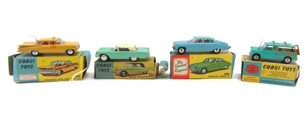 Four Corgi die-cast vehicles, comprising; 214 Ford Thunderbird, 221 Chevrolet New York taxi cab, 485 Surfing with the BMC Mini Countryman, and 238 Jag