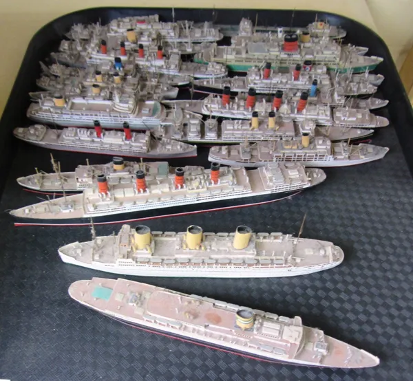 A quantity of miniature painted wooden model ships, 20th century, including; Aquitania, Empress of Britain, Adriatic, Mauretania, Carolina and others,