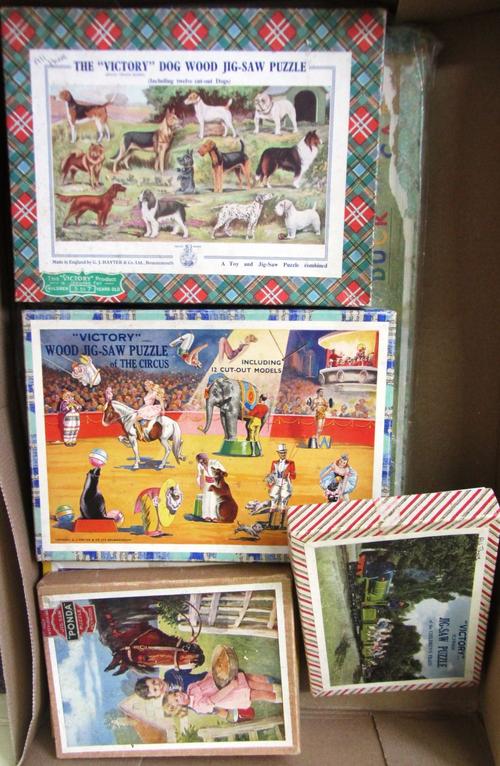 A quantity of Victory vintage wooden jigsaw puzzles, comprising; British Battleship, Golden Arrow, Ponda, The Circus, Dog, Children's Train, Domestic