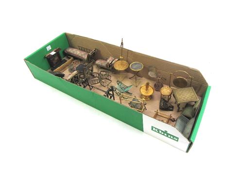 A quantity of vintage dolls house furniture and accessories, mainly metal items, including; a wooden fireplace, a single bed, two chaise longues and t