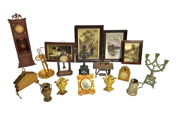 A quantity of vintage dolls house furniture and accessories, mainly metal items, including; mantel clocks, a candelabra, an umbrella stand, a paper ra