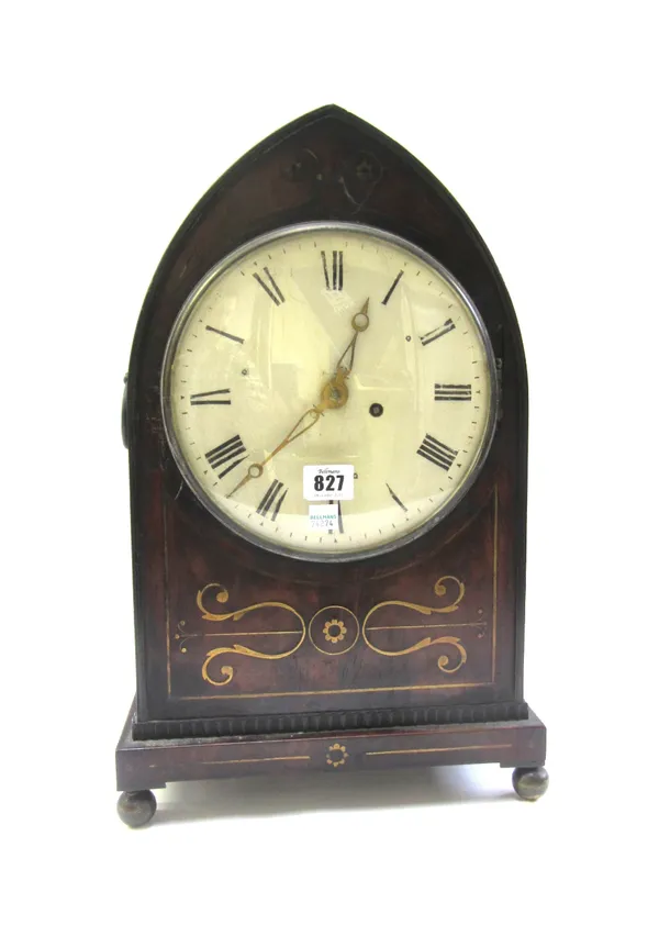 A mahogany and brass inlaid mantel timepiece, mid-19th century, of lancet form, with a white painted dial and single fusee movement, 46cm high (pendul