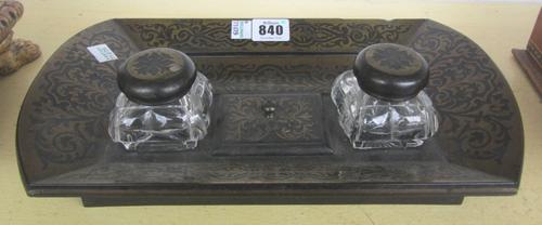 A French 19th century boulle work desk stand, combining twin glass inkwells and a pen recess (32cm wide), a polychrome painted giltwood casket, raised