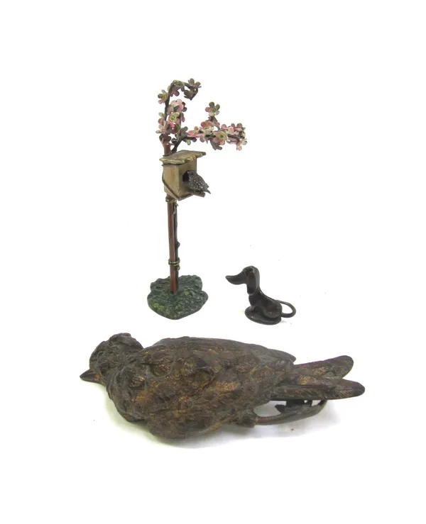 A Bergmann style cold painted bronze bird box, modelled bound to a sapling, indistinct marks (11cm high), a Hagenauer type hound (3cm high) and a Vict