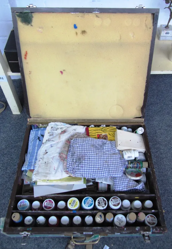 'Fleur Cowles', original paint box, the hinged lid opening to reveal a compartmented interior with paints, brushes and related items, 57cm wide. Prove