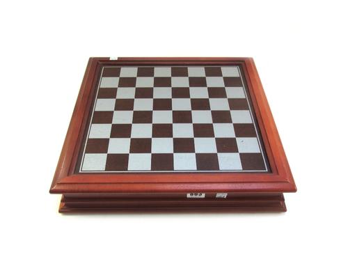 A Danbury Mint 'Lord of the Rings' pewter chess set, with board, each playing piece holding a facet cut circular crystal, complete with certificate of
