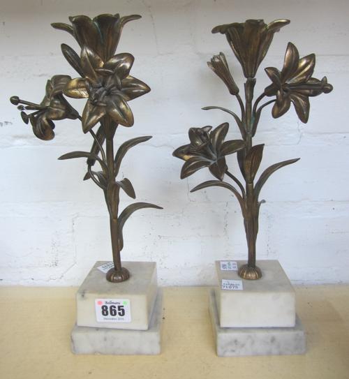 A pair of bronze foliate cast candlesticks, early 20th century, raised on a stepped marble base (28cm high), an early 19th century boulle work case en