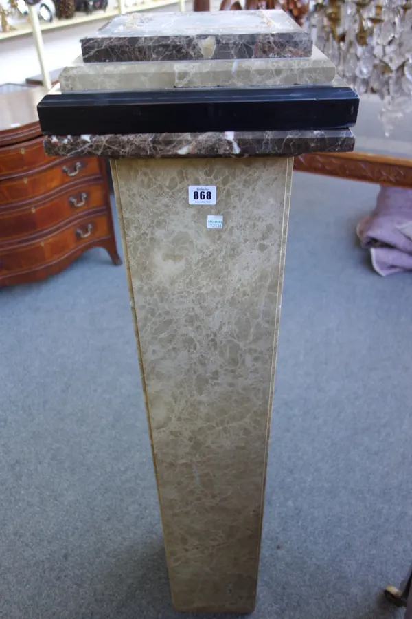 A pair of marble veneered columns, 20th century, of square stepped form, 124cm high. (2)