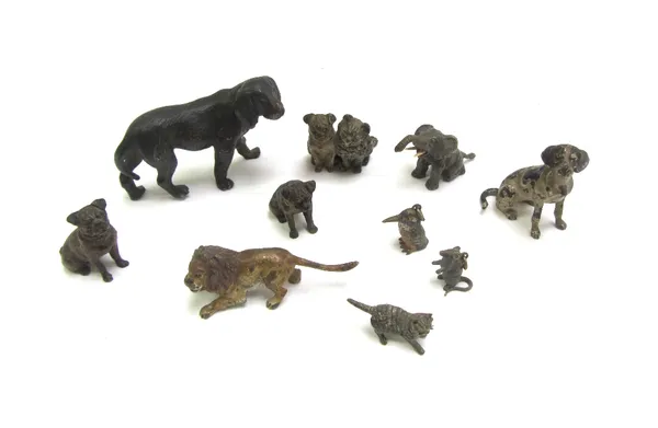 Ten Austrian cold painted bronze miniature animals, early 20th century, the dog and cat group stamped 'Geschutz', also comprising; four dogs, a cat, a