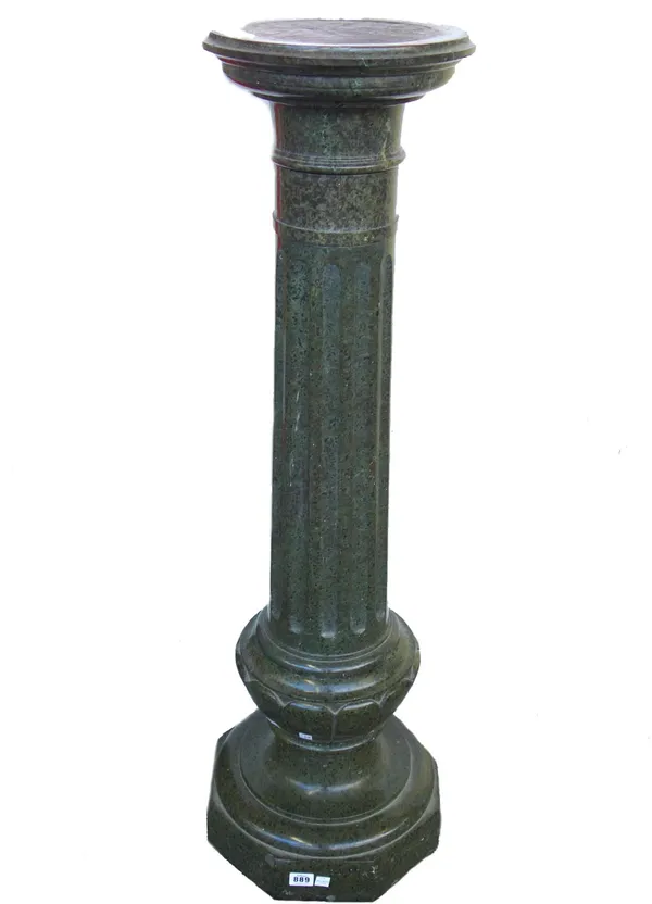 A 19th century green and black mottled marble pedestal, with revolving top, fluted column and octagonal plinth (a.f).