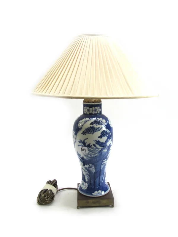 A pair of Chinese Xang Xi blue and white vases, late 19th century, each of baluster form, converted to table lamps, with pleated silk shades, the vase