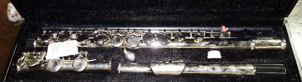 A 20th century 'Lindo' silver plated flute, cased. CAB