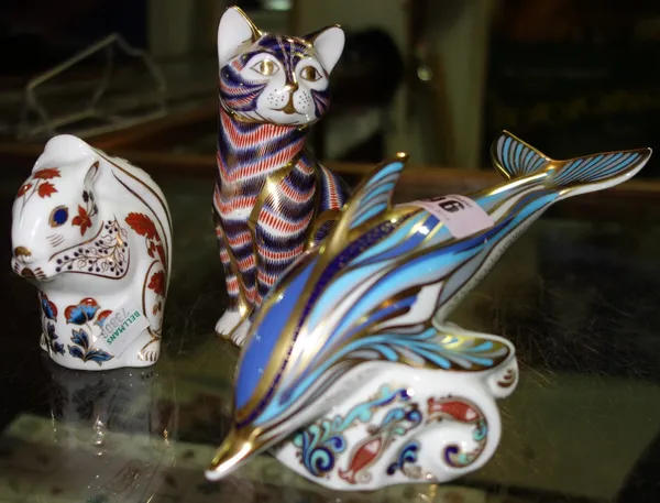 A Royal crown Derby Imari pattern paperweight modelled as a cat and another as a squirrel and another as a dolphin. CAB