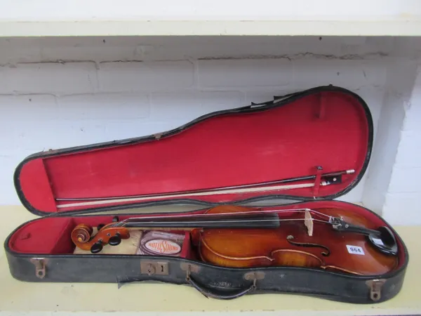 A viola, mid-20th century, interior paper label reads 'Copy of Antonius Stradivarius', 16 inches, with a bow; and a violin, interior paper label reads