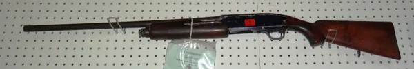 A 'Manufrance' 12 bore pump action shotgun, deactivated with certificate.