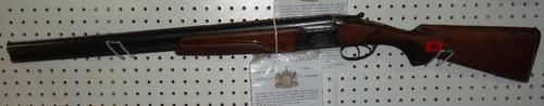 A 'Baikal'12 bore over and under shotgun.