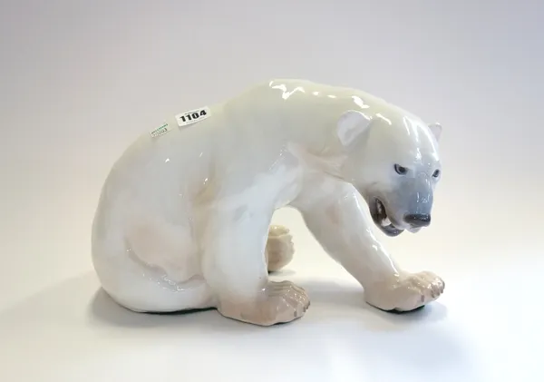 A Bing and Grondahl large model of a seated polar bear, no.1857, 21cm high.