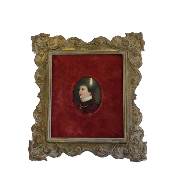 A Continental porcelain oval portrait miniature, late 19th century, depicting a lady in a purple ruffed robe, housed in a giltwood frame, the plaque 8