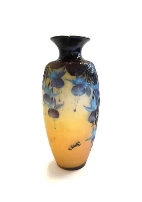 A Galle cameo glass vase, early 20th century, moulded with purple and blue exotic flowers against a yellow ground, signed Galle to the body (a.f), 30c
