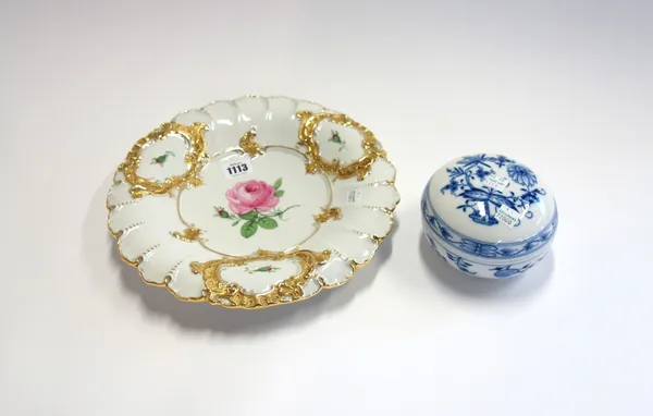 A modern Meissen dish, centrally decorated with a pink rose within a moulded gilt border, 29cm diameter, together with a 20th century Meissen blue and