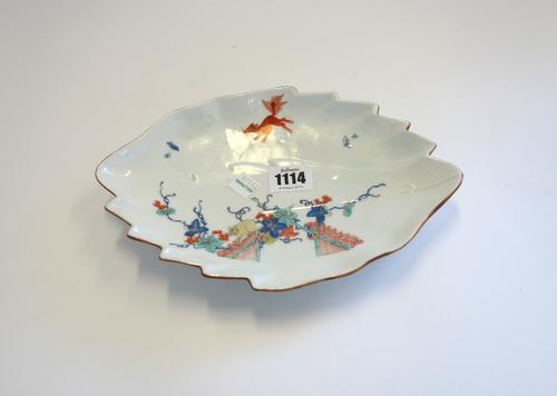 A group of Samson porcelain, late 19th century, comprising; a miniature garniture of three baluster vases and a cover, painted in Chinese armorial sty