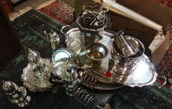 A quantity of silver plated wares, to include; bottle coasters, a wine cooler, hot water jugs, a toast rack, a pair of waiters, a twin handled oval tr