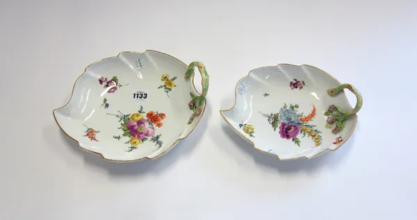 A Meissen porcelain leaf shaped serving dish, late 19th century, decorated with floral sprays, 25cm wide, together with another smaller Meissen dish.