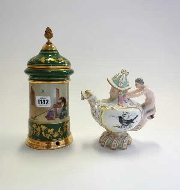 A Sevres style green ground jar and cover, 20th century, centrally decorated with an interior scene, 25cm high and a German porcelain teapot and cover