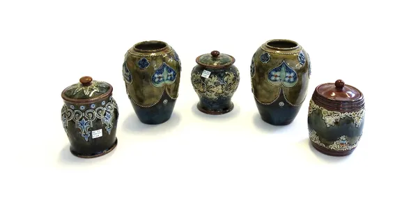 A pair of Royal Doulton stoneware vases, early 20th century, each Art Noveau decorated with stylised foliate bands against a mottled green ground, imp