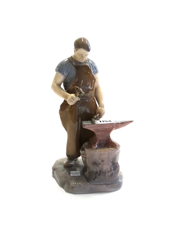 A Bing and Grondahl porcelain figure, no.2225, modelled as a blacksmith, 28.5cm high.